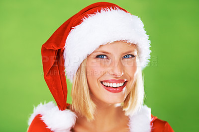 Buy stock photo Woman, Christmas hat and celebration in studio for season holiday, vacation happiness or fun fashion. Female person, smile and portrait in red costume or green background, winter break joy or excited