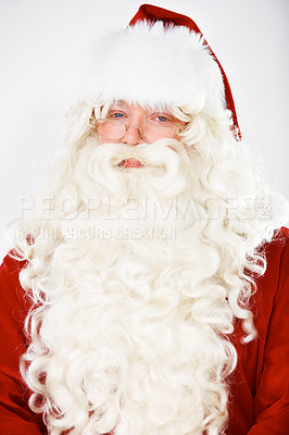 Buy stock photo Christmas, celebration and portrait of Santa in a studio with glasses against a white background. Suit, tradition and face of a man in red to celebrate the holiday with a costume for a festive event