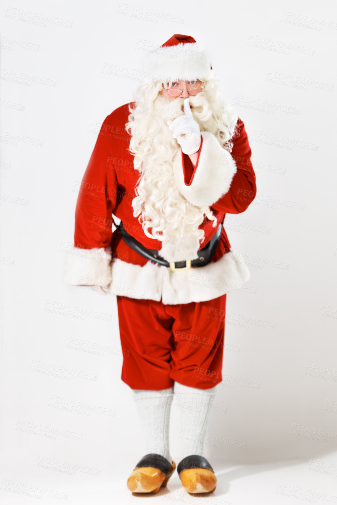Buy stock photo Full length portrait of Santa instructing silence - isolated on white