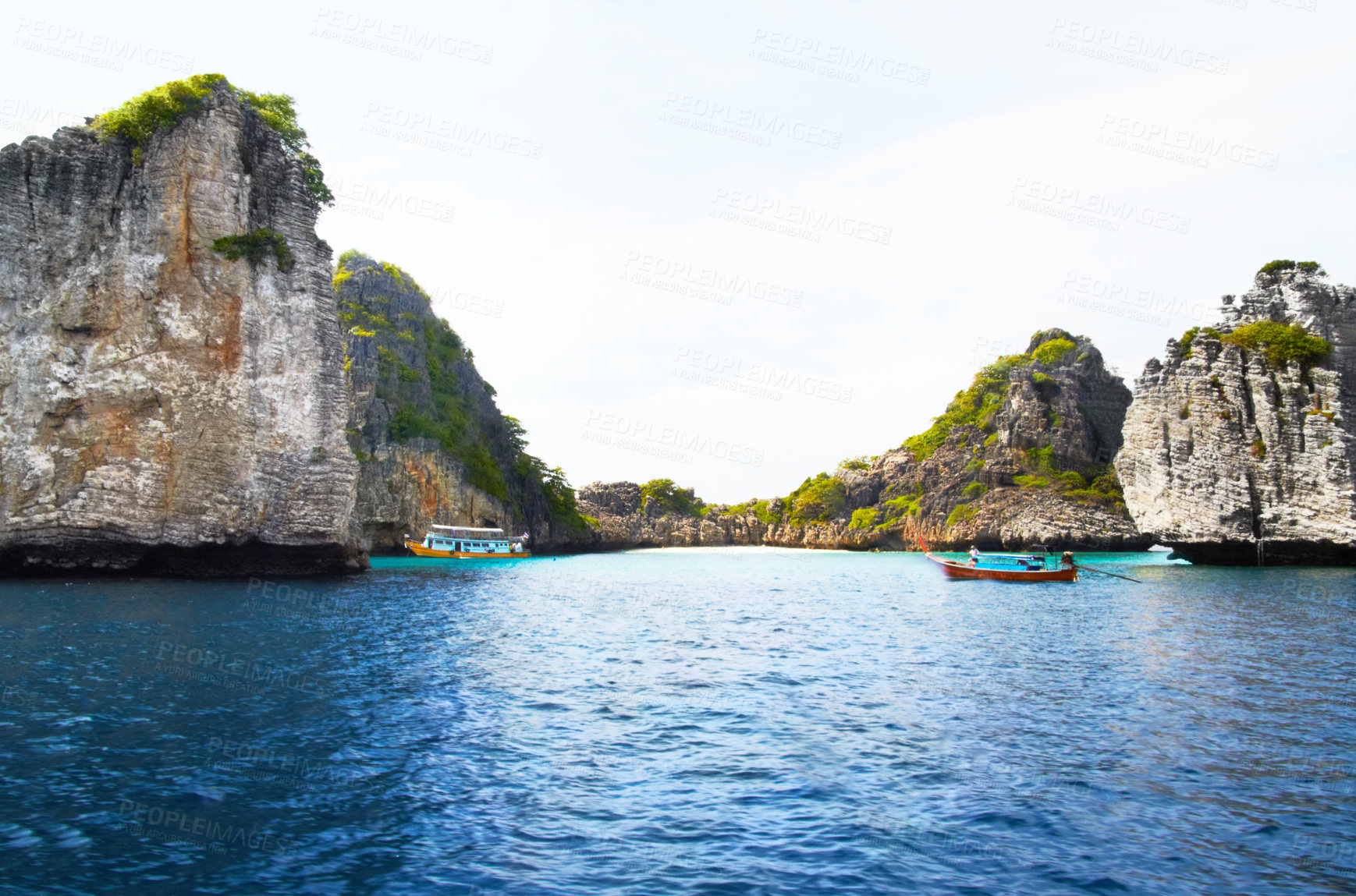 Buy stock photo Island, ocean and mountains background for tropical, adventure and holiday with boats, journey and travel. Outdoor, nature and landscape of blue water, calm sea and rocks or cliff for secret vacation