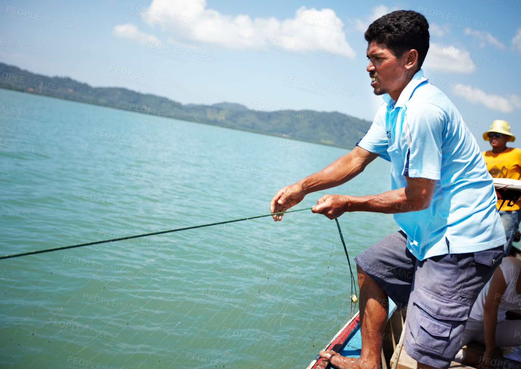 Buy stock photo Fisherman, boat and man with net at sea, lake or hunting in water in tropical summer. Fishing, rope and person at ocean on ship transport to catch food, pulling work or trawling in nature in Thailand