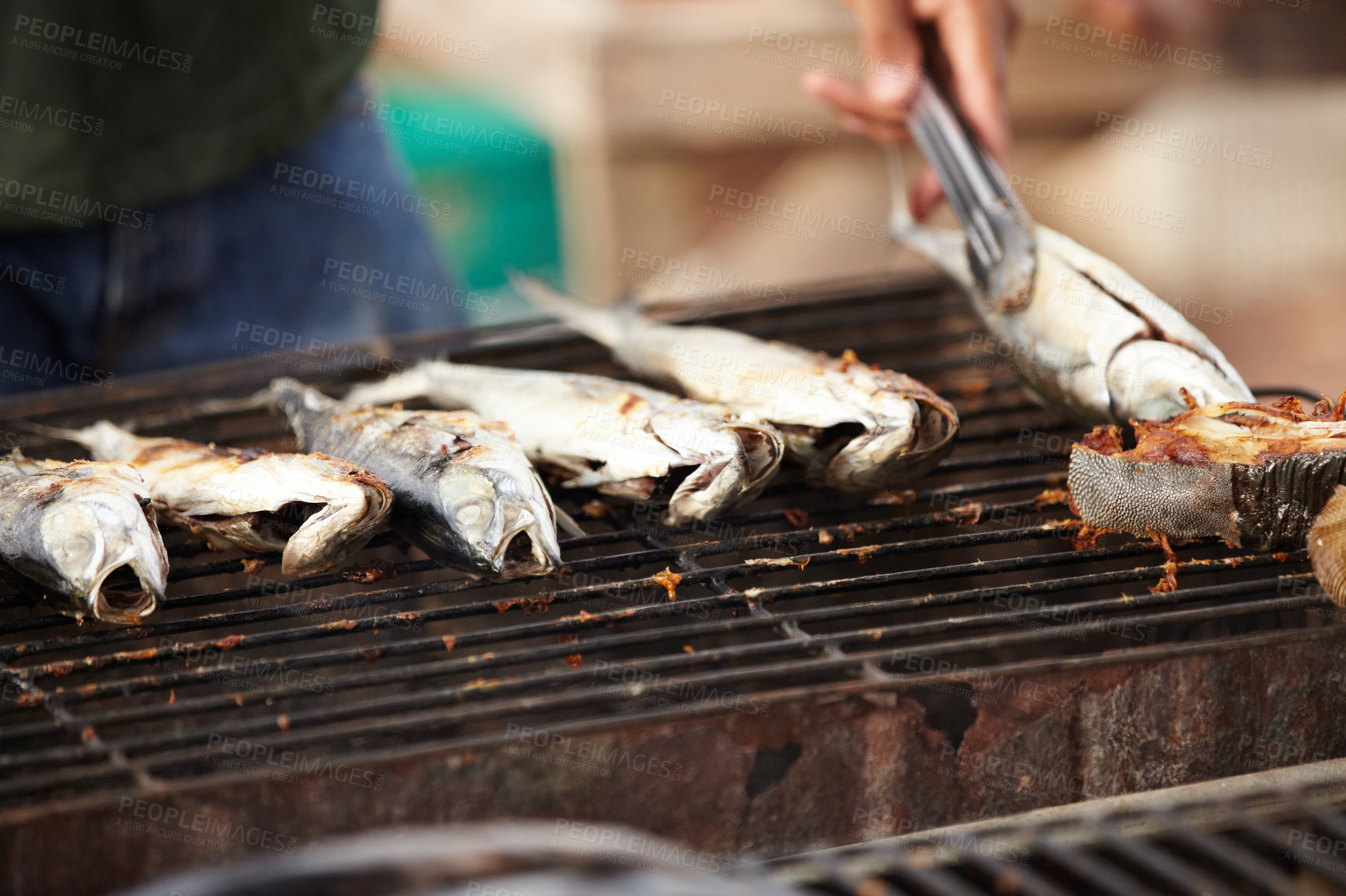 Buy stock photo Fish, food and girll at a street market in Thailand for nutrition or local delicacy during travel closeup. Cuisine, trade and seafood outdoor for purchase or experience of culture and tradition