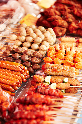 Buy stock photo Meat, skewers and local market with food sale, shopping and choice for retail or small business background. Seller or entrepreneur with sausage, pork and bbq or chicken stick for restaurant or buffet