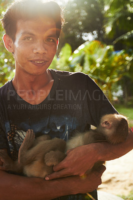 Buy stock photo Zoo, nature and portrait of man with monkey for care, conservation and wildlife rescue. Sanctuary, travel and happy person with macaque in environment, ecosystem and animal park for Thailand tourism