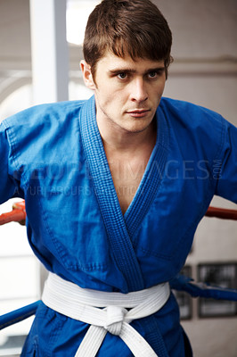 Buy stock photo Man, karate and fight, sports contest with muay thai and training for self defense in gym. Athlete, combat and power with fitness, martial arts and energy with warrior, exercise and taekwondo