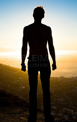Buy stock photo Man, silhouette and mountain in sunset for achievement, adventure or hiking journey in nature. Male hiker standing on cliff for trekking exercise view, accomplishment or motivation for fitness goals