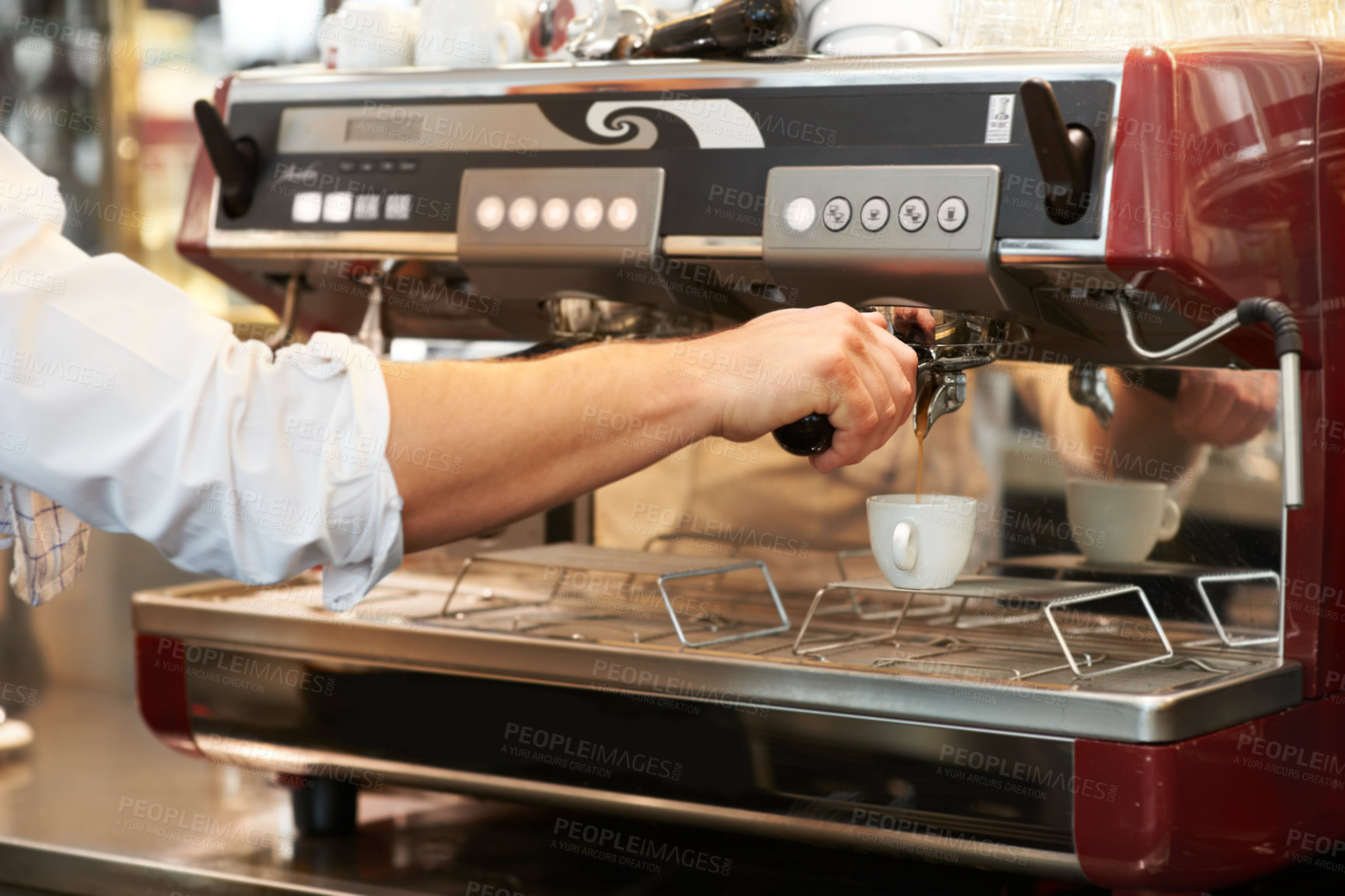 Buy stock photo Coffee machine, closeup and man barista in a cafe making latte, cappuccino or espresso in a cup. Equipment, mug and zoom of male waiter or small business owner working on an order in a restaurant.