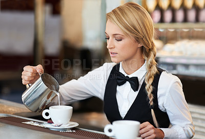 Buy stock photo Barista woman, pouring milk and coffee cup with service, drink and latte for job, cafe and career. Waitress, girl or server with tea, cappuccino or coco for beverage in shop, store or restaurant