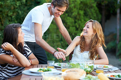 Buy stock photo Smiling young people at a lunch with a group of friends - portrait