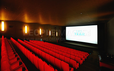 Buy stock photo An empty cinema or movie theatre with a big screen and rows of red seats