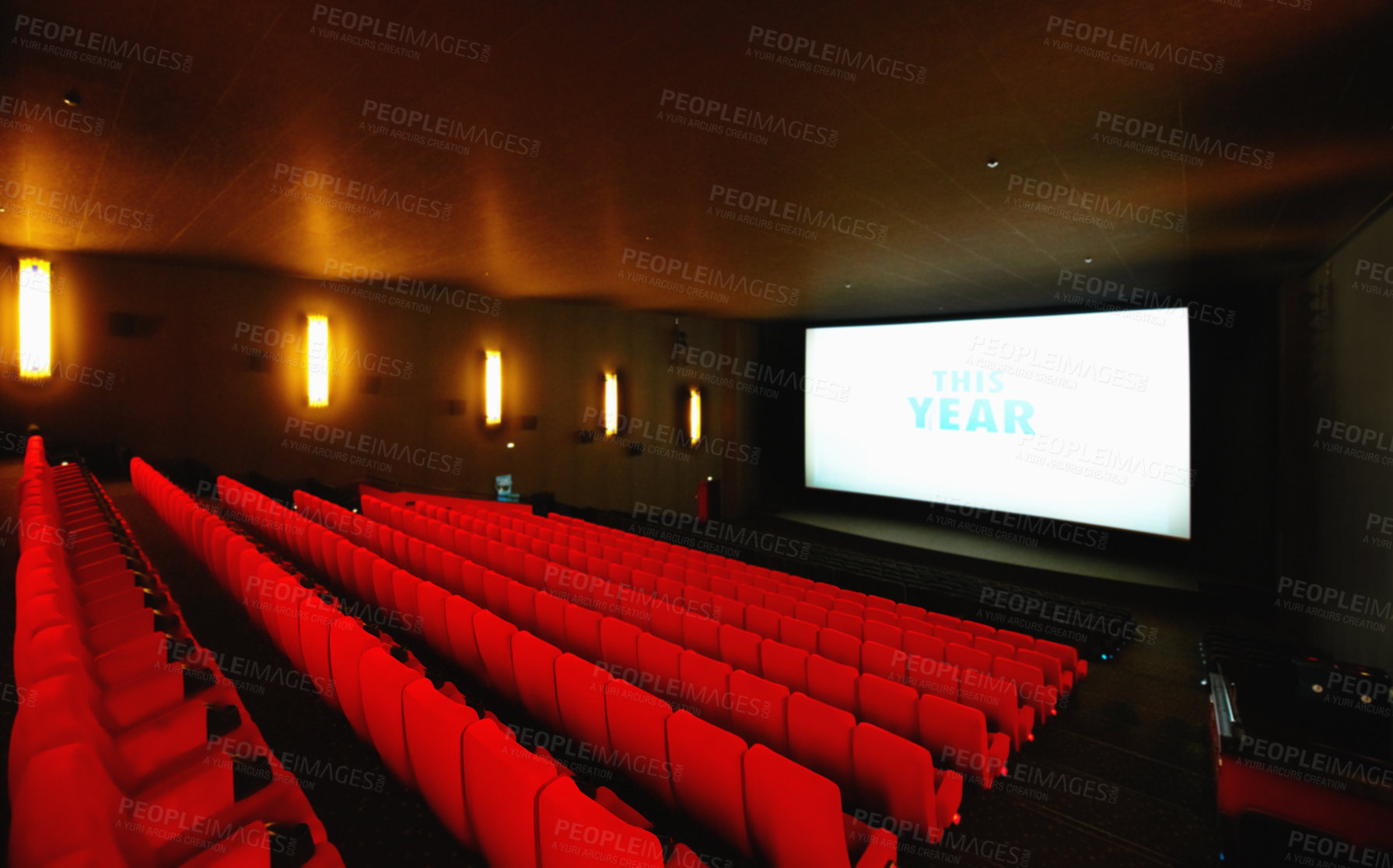 Buy stock photo An empty cinema or movie theatre with a big screen and rows of red seats