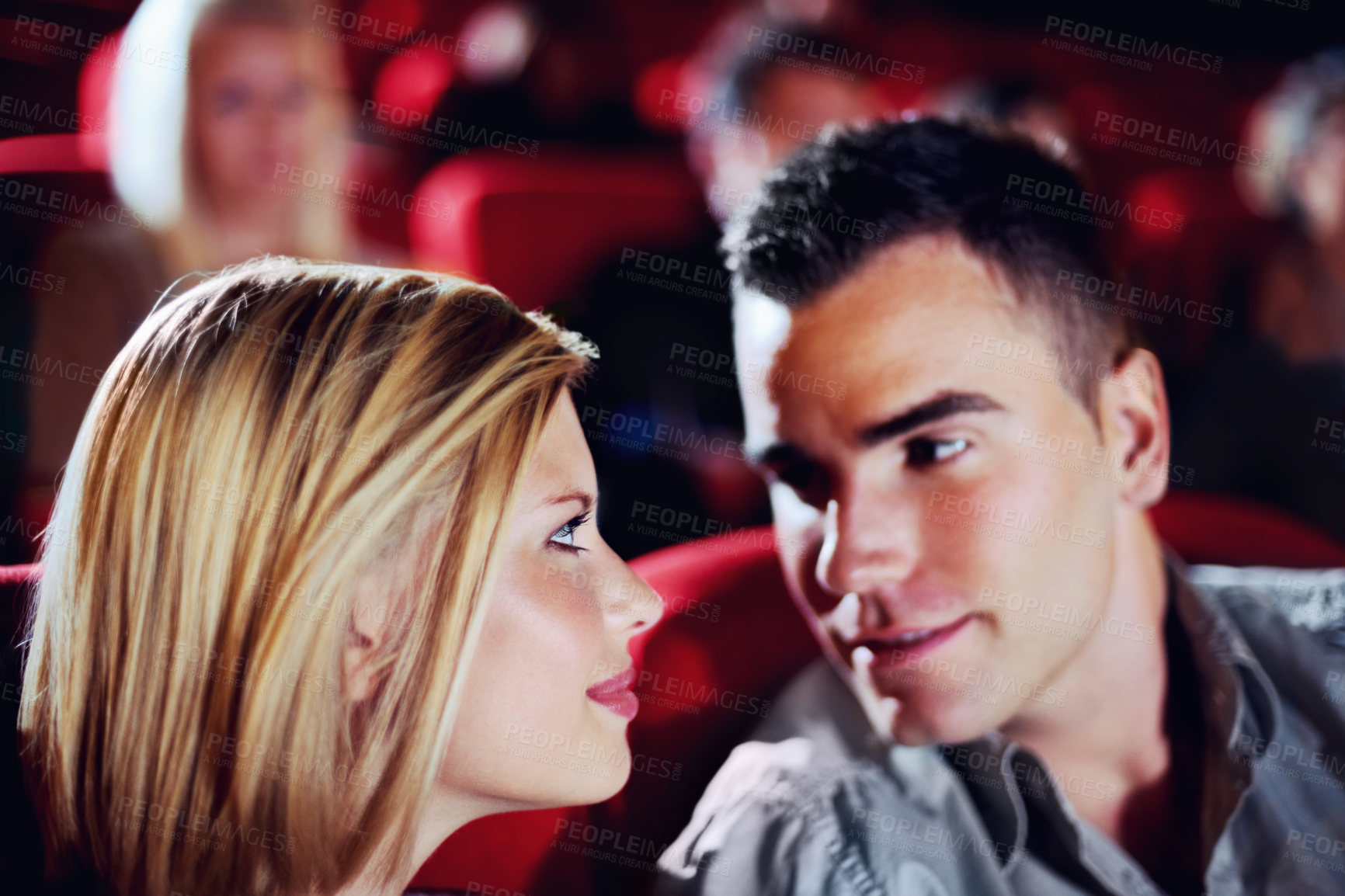 Buy stock photo Cinema, romance and couple watching film, love and romantic date together. Movie night, man and woman in theater with smile, attraction and sitting in auditorium to relax   at show with happiness.