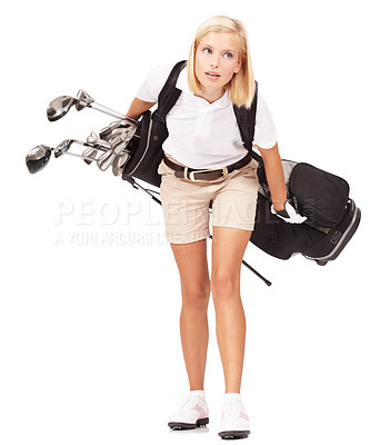 Buy stock photo Sports, athlete and woman golfer in a studio with clubs for exercise, training or golfing motivation. Fitness, golf and female model carrying heavy sport equipment isolated by a white background.