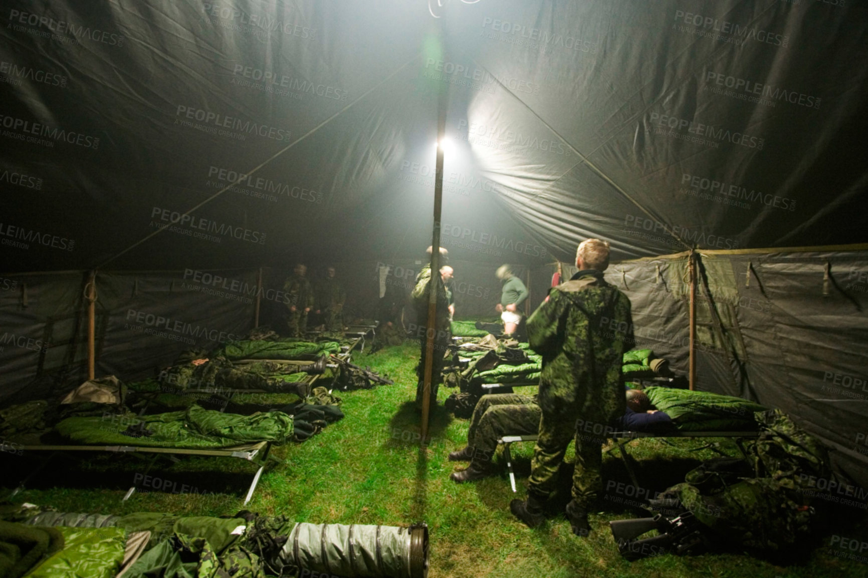 Buy stock photo Soldiers getting ready to bunk down inside of their large tent - This is the real thing from KFOR, Kosovo 1999. This image is part of our historic collection. The digital cameras available back then where very bad, so expect exceptionally bad image quality