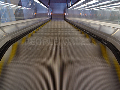 Buy stock photo Top view, stairs and escalator in modern building for travel, moving and transport in airport. Metal, steel and closeup of electrical stairway in shopping mall, office or subway for urban commute