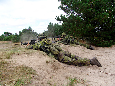 Buy stock photo Military, soldier and target with weapon and aim for fitness, battle or challenge outdoor with gear or hiding. Army, people and attack for workout, mission or bootcamp with camouflage for survival