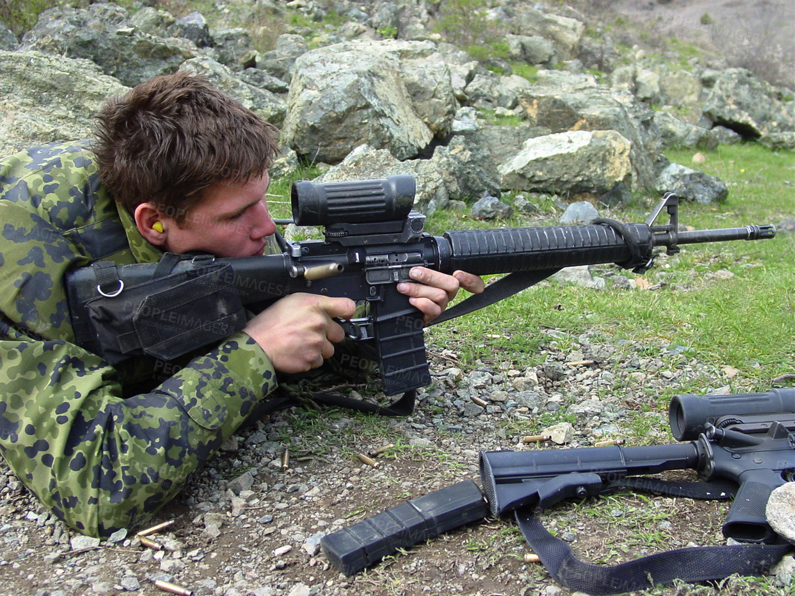 Buy stock photo Soldier, sniper and man with a weapon, military and war with combat, fighting and battlefield with conflict. Person, warrior or guy on the ground, gun or shooting at target with army, outdoor or hero