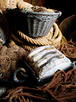 Buy stock photo Closeup of fishing basket, lines and rope, net and storage of traditional equipment at port. Tools, fishery and mesh, vintage wood and old metal, retro cordage and antique fishnet in industry