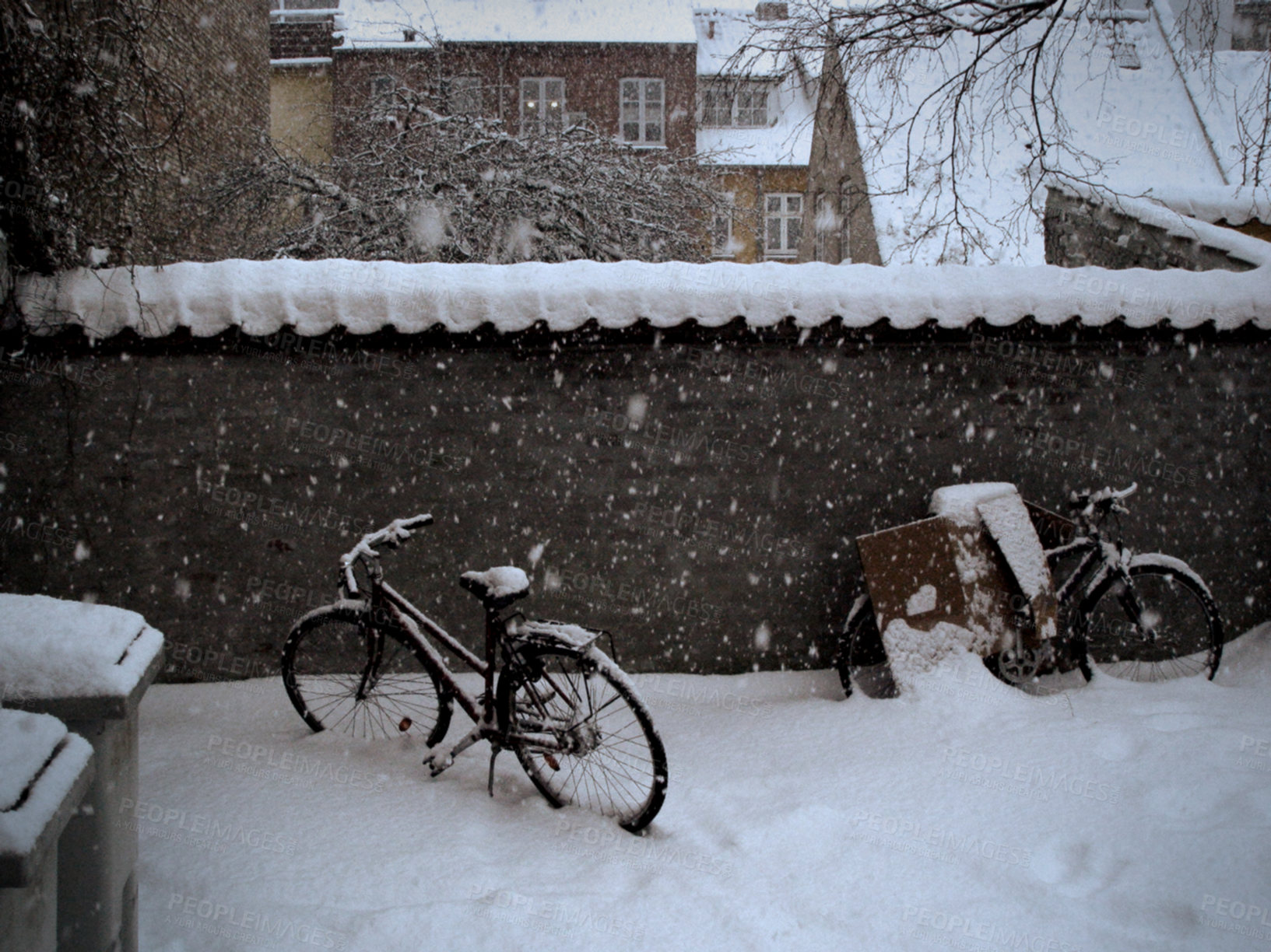 Buy stock photo Snow, storm and bike outdoor by a house, real estate or buildings with landscape or neighborhood. Winter, environment or location for bicycles in nature with ice, tree or apartment background in city