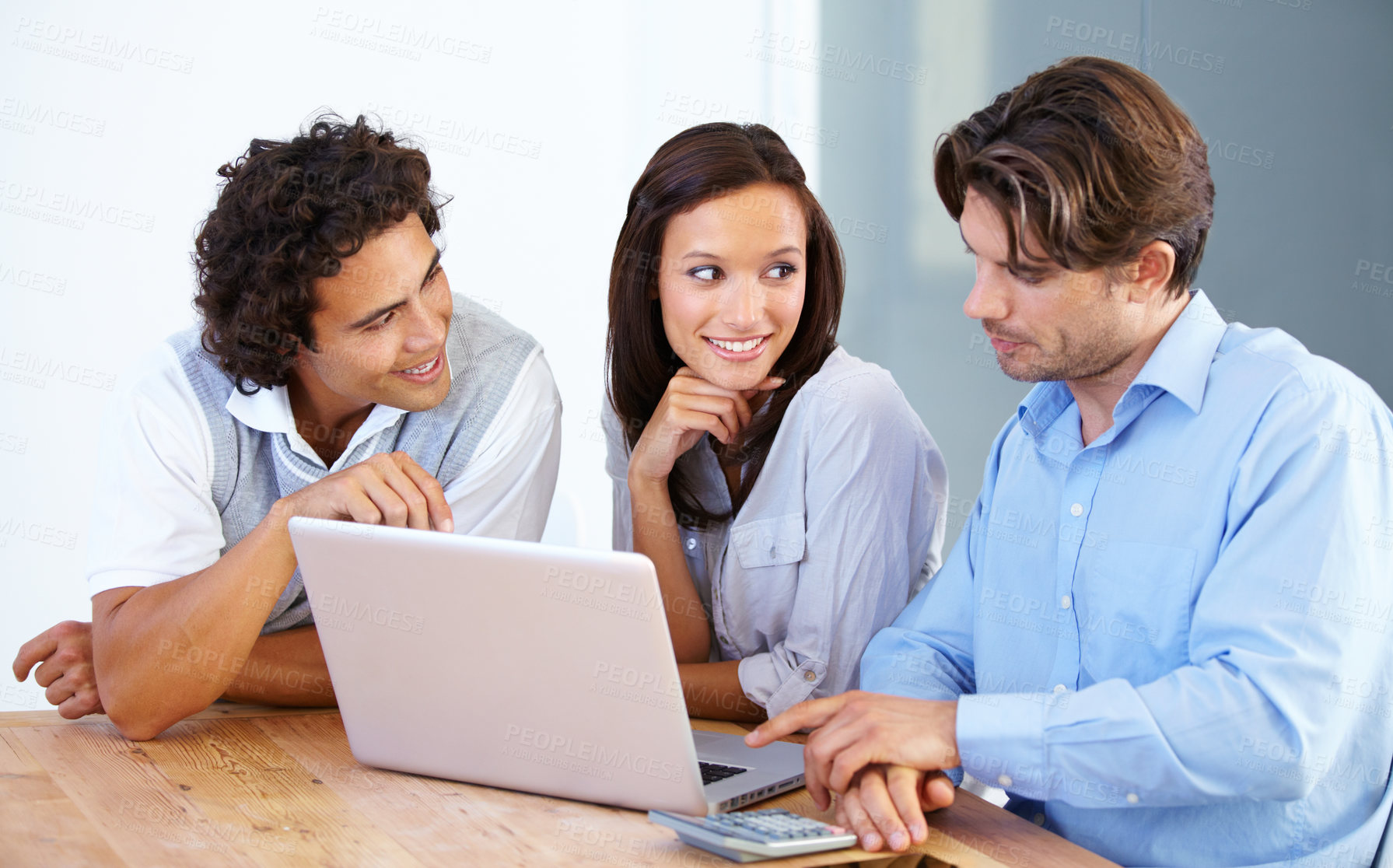 Buy stock photo A group of young entrepreneurs having a business meeting