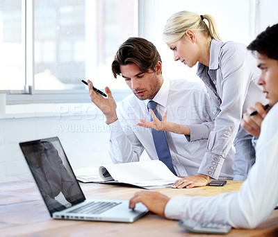 Buy stock photo Group of businesspeople working together as a team in a boardroom