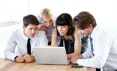 Buy stock photo Collaboration, laptop or research with a business team in the boardroom, working together on a project. Teamwork, planning or strategy with men and women employees at work in the office on a computer