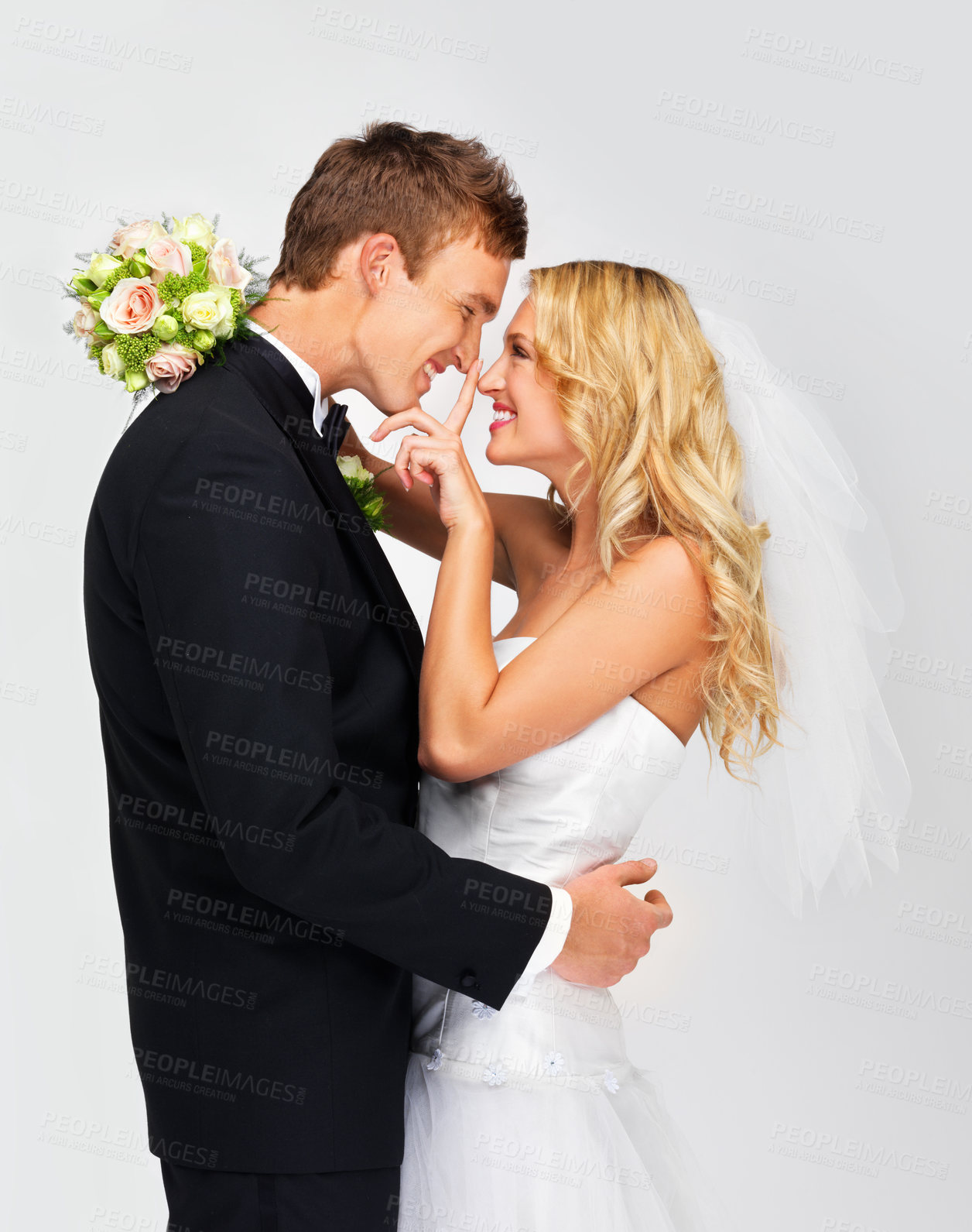 Buy stock photo Happy couple in celebration at their wedding day, love in marriage and happiness of young man and woman at ceremony together. Bride and groom on white background, people smile with bouquet flowers