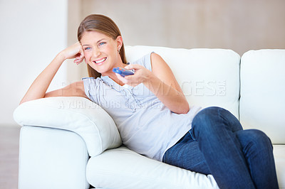 Buy stock photo Woman, remote control and watching tv on couch, happy at home with entertainment and streaming with internet. Subscription, change the channel with network and movie, film or show choice with smile