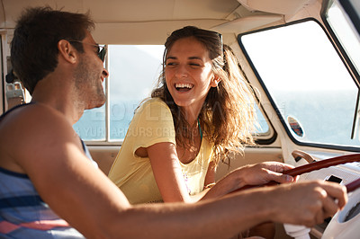 Buy stock photo Happy couple, driving and laughing for funny road trip, travel or summer holiday weekend in the car. Man and woman traveling in mini van with laugh and smile for fun discussion or joke on journey