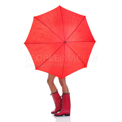 Buy stock photo Cover, weather and woman holding a red umbrella, wearing gumboots and girl isolated against a white studio background. Female person, lady and model with insurance, protection and winter outfit