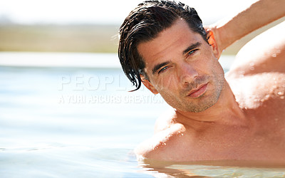 Buy stock photo Rooftop, pool and portrait of man swimming outdoor for travel, freedom or summer holiday at resort. Relax, water and face of male swimmer in nature for luxury getaway at villa, spa or hotel vacation