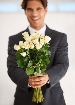 Buy stock photo Gift, portrait and happy man with flowers for love, giving or valentines day celebration on wall background. Face, roses and person with bouquet for anniversary, romance or congratulations gesture