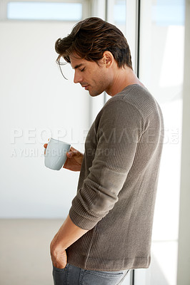 Buy stock photo Coffee, handsome and young man at apartment with memory, vision or reflection face expression. Thinking, morning and male person from Canada with latte, cappuccino or espresso with an idea at home.