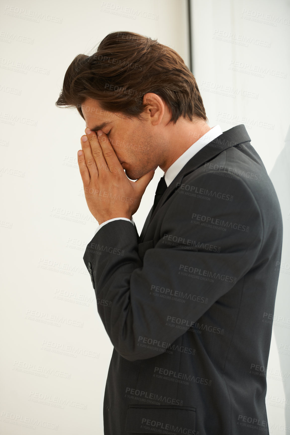 Buy stock photo Stress, anxiety and business man in office with fear, worry or desperate prayer for help on wall background. Nervous, mistake and profile of male manager with headache for startup, disaster or fail