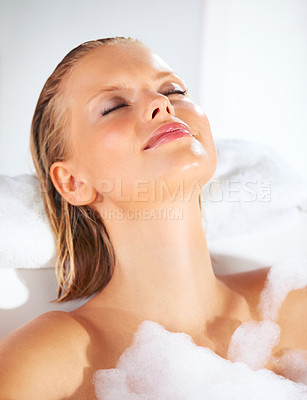 Buy stock photo Relax, woman smile and bath with foam, skincare and beauty for hair and shampoo treatment at home. Morning, sleep and calm female person with cosmetics, soap and bubble in a bathroom with cleaning