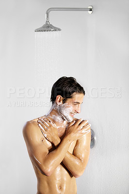 Buy stock photo Shower, man and home with body cleaning and soap in the morning in bathroom. Water, young male person and smile with hygiene and clean skin care in a house with cosmetic grooming and shaving foam 