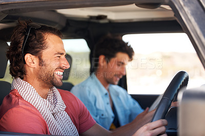 Buy stock photo Shot of a young man on a roadtrip