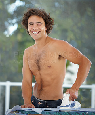 Buy stock photo Happy, portrait and a man ironing a shirt, doing chores and housework in the morning at home. Laughing, handsome and a guy with tools to iron clothes, housekeeping and getting ready with a smile