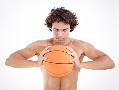 Buy stock photo Sports, squeeze and man with basketball in studio isolated on a white background. Sport, fitness and athlete holding ball, eyes closed and ready for training, exercise or workout for wellness.