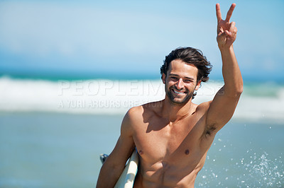 Buy stock photo Surfing, portrait and happy man with peace hands at a beach for travel, freedom or adventure. Face, smile and male surfer with v sign at sea for water sports, training or summer vacation in Miami
