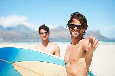 Buy stock photo Beach, pointing and man surfing friends outdoor together for summer vacation or holiday trip overseas. Surf, sea or travel with a young male surfer in sunglasses and friend bonding on an ocean coast