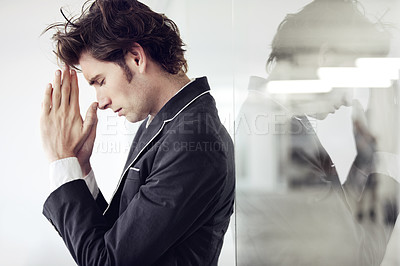 Buy stock photo Praying, religion and young man in a studio with double exposure for gratitude, hope or worship. Trust, compassion and male model from Canada with regret or mistake isolated by white background.