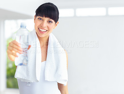 Buy stock photo Portrait, fitness and woman with a water bottle, training or exercise with hydration, towel or mockup space. Person, happy girl or athlete with liquid, aqua or workout with offer, thirsty or wellness