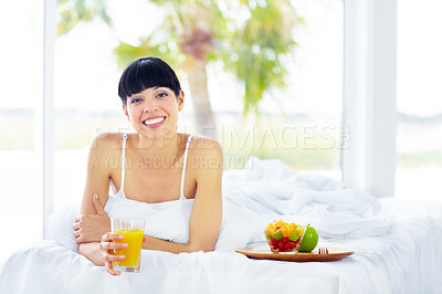 Buy stock photo Orange juice, happy portrait and bedroom woman with glass drink for morning hydration, liquid detox or natural wellness. Fruit salad, home bed and nutritionist thirsty for organic citrus beverage