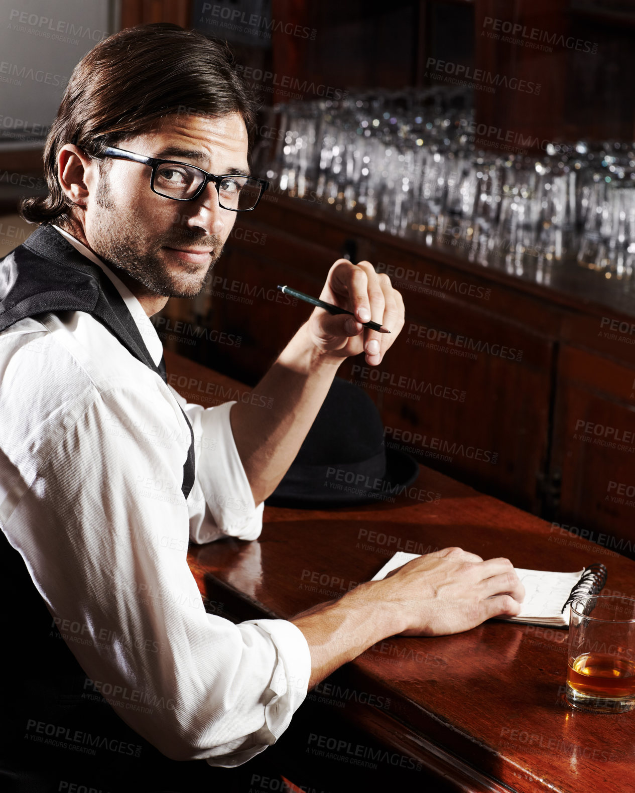 Buy stock photo Portrait, writer and man with a notebook, whiskey and creativity with inspiration, journalist and glasses. Face, person and author with alcohol, ideas and writing in a tavern, poet and freelancer