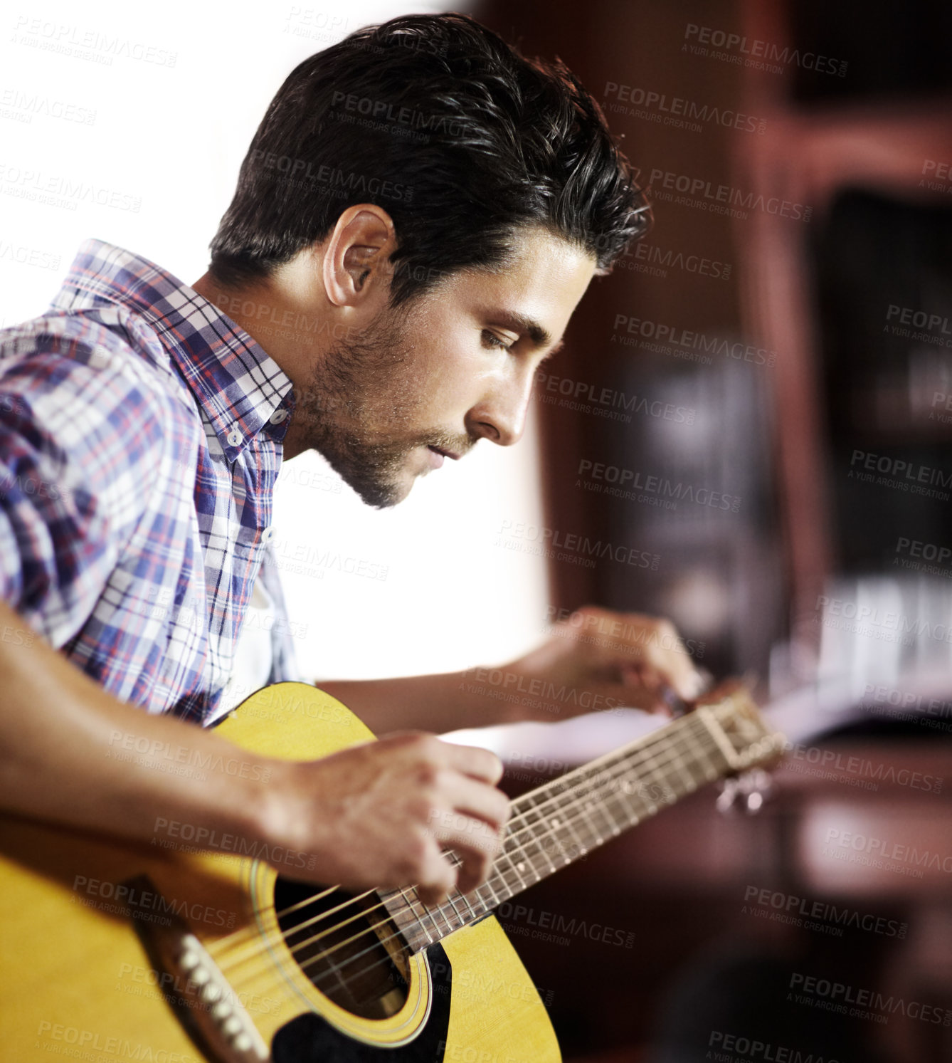 Buy stock photo Guitar, tuning or man in house for music, performance or entertainment in living room with talent. Learning solo, acoustic strings or creative musician playing an instrument for artistic expression 