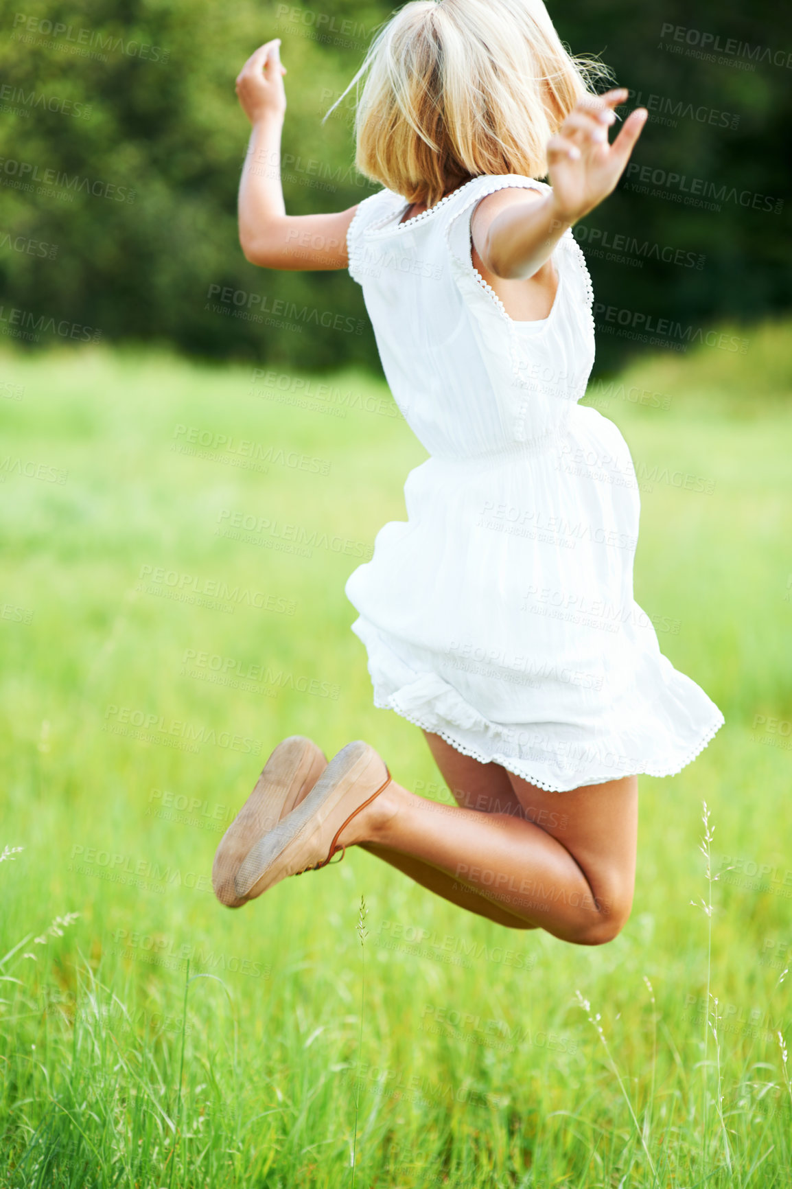 Buy stock photo Freedom, jump and woman in a field with celebration, energy or travel success in nature. Jumping, adventure and female person in a park excited, happy and having fun in grass on a holiday in Mexico