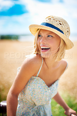 Buy stock photo Funny woman on bicycle in the countryside, happiness and travel on journey or thinking outdoor. Smile, bike and excited person laughing at field on transport, freedom and cycling in nature in summer