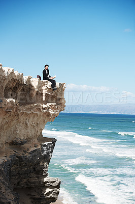 Buy stock photo Freedom, cliff and business man by ocean reading book for success, opportunity and career in nature. Professional, mockup and corporate worker on rocks edge for work challenge, ideas and future