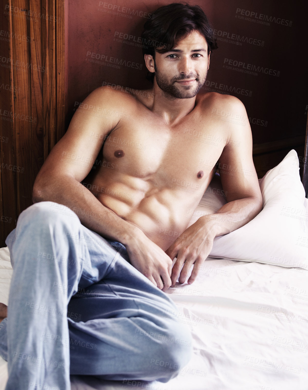 Buy stock photo Portrait, sexy and man relax on bed with muscles, six pack and strong shirtless body at home. Muscular, handsome and happy guy rest in bedroom with bare abs, topless desire and good mood in morning
